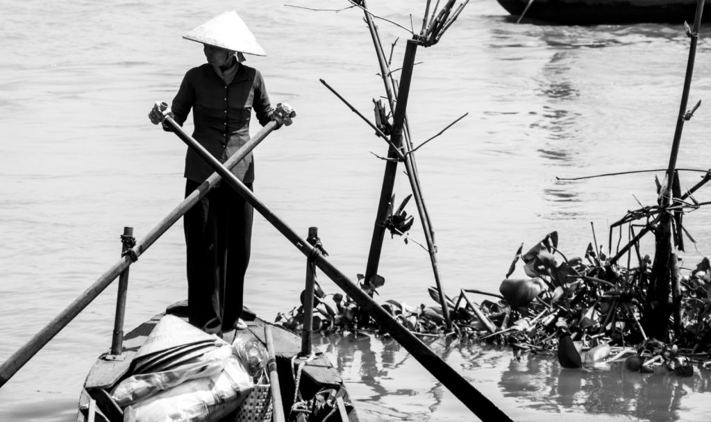 boat driver in Mekong Delta